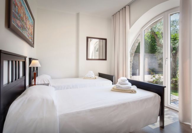 Villa a Bardolino - Villa Lisi - 8 posti letto, in residence con piscina a Bardolino Villa a Bardolino - Villa Lisi - 8 posti letto, in residence con piscina a Bardolino