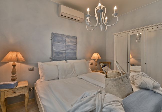 Appartamento a Tignale - Borgo le Vigne, L'Acqua vite con colazione e centro wellness - ONLY ADULTS Appartamento a Tignale - Borgo le Vigne, L'Acqua vite con colazione e centro wellness - ONLY ADULTS