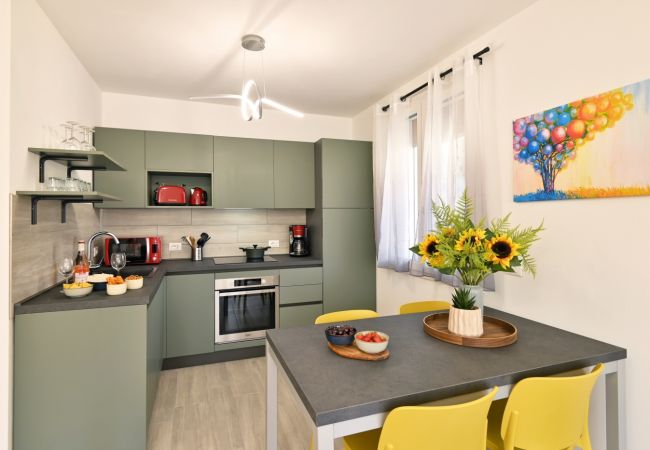 Appartamento a Tignale - Il Girasole by Theater Home - vicino al centro con ampio giardino Appartamento a Tignale - Il Girasole by Theater Home - vicino al centro con ampio giardino