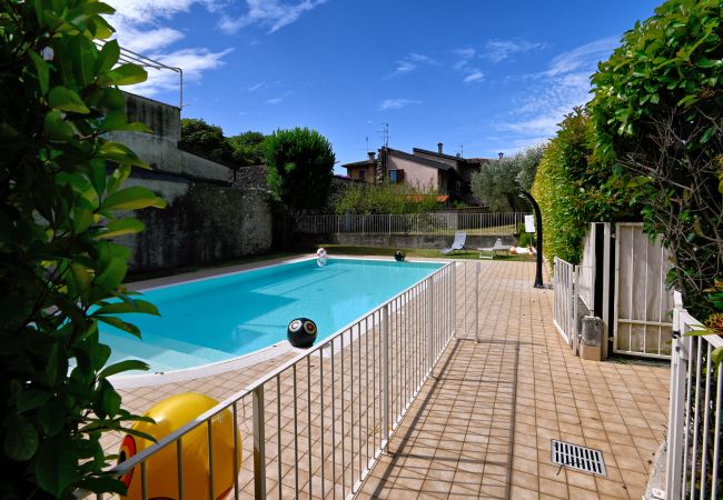 Appartamento a Toscolano-Maderno - Casa mia by Theater Home - con giardino e piscina Appartamento a Toscolano-Maderno - Casa mia by Theater Home - con giardino e piscina