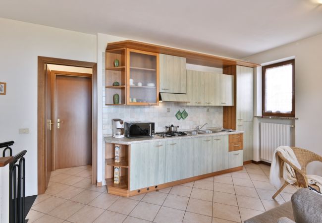 Ferienwohnung in Tignale - Angelica 5 by Theater Home, mit eingezäuntem Garten und Seeblick Ferienwohnung in Tignale - Angelica 5 by Theater Home, mit eingezäuntem Garten und Seeblick
