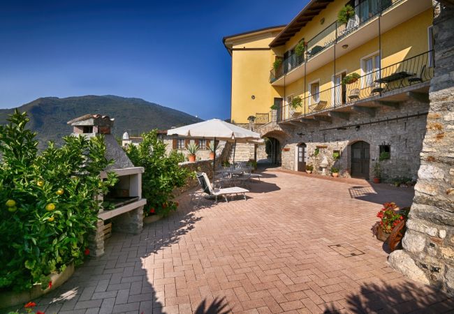 Ferienwohnung in Tignale - Rustico Kristi - Theater Home, mit wunderschönem Seeblick Ferienwohnung in Tignale - Rustico Kristi - Theater Home, mit wunderschönem Seeblick