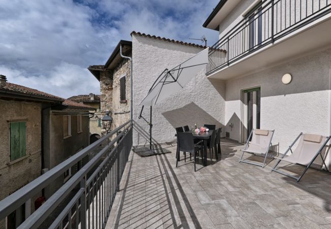 Ferienwohnung in Tignale - Appartamento Stella by Theater Home - mit großem Terrasse und teilweise Seeblick Ferienwohnung in Tignale - Appartamento Stella by Theater Home - mit großem Terrasse und teilweise Seeblick