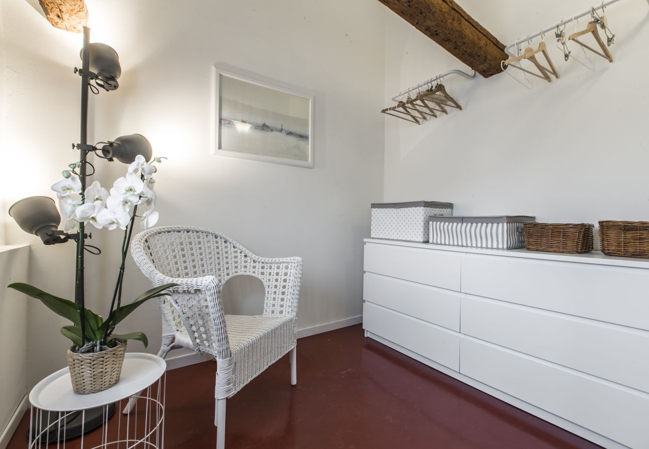 Large walk-in closet Large walk-in closet